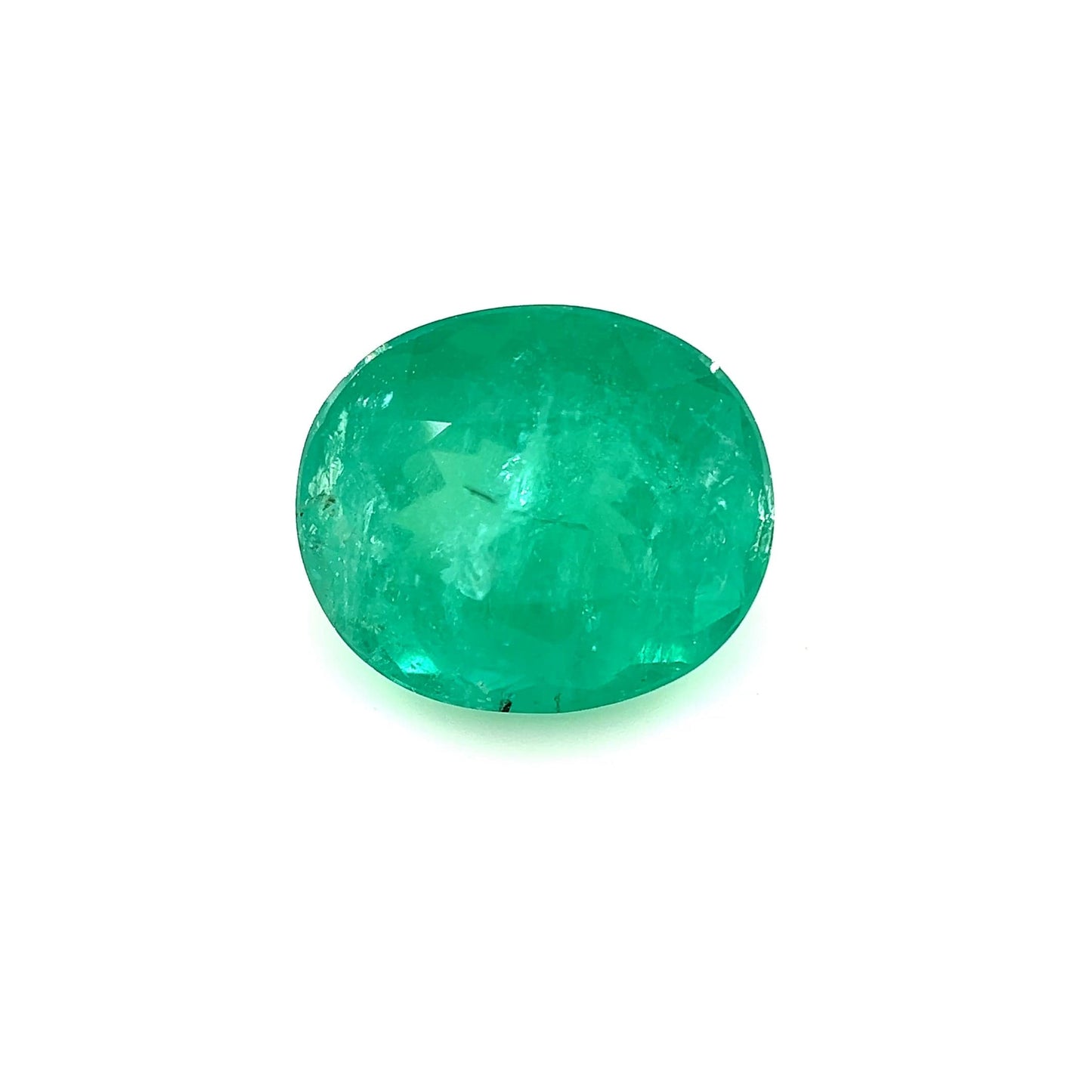 A 3.60Cts Better Oval Emerald gemstone is displayed on a plain white background.