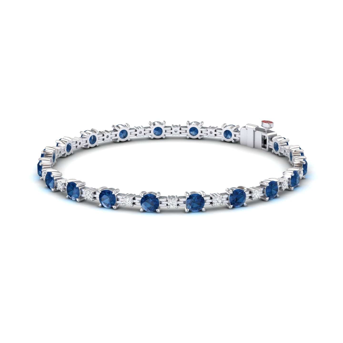 The London Blue Topaz & Diamond Tennis Bracelet - Natalia features round blue gemstones in prong settings, shown on a white background.