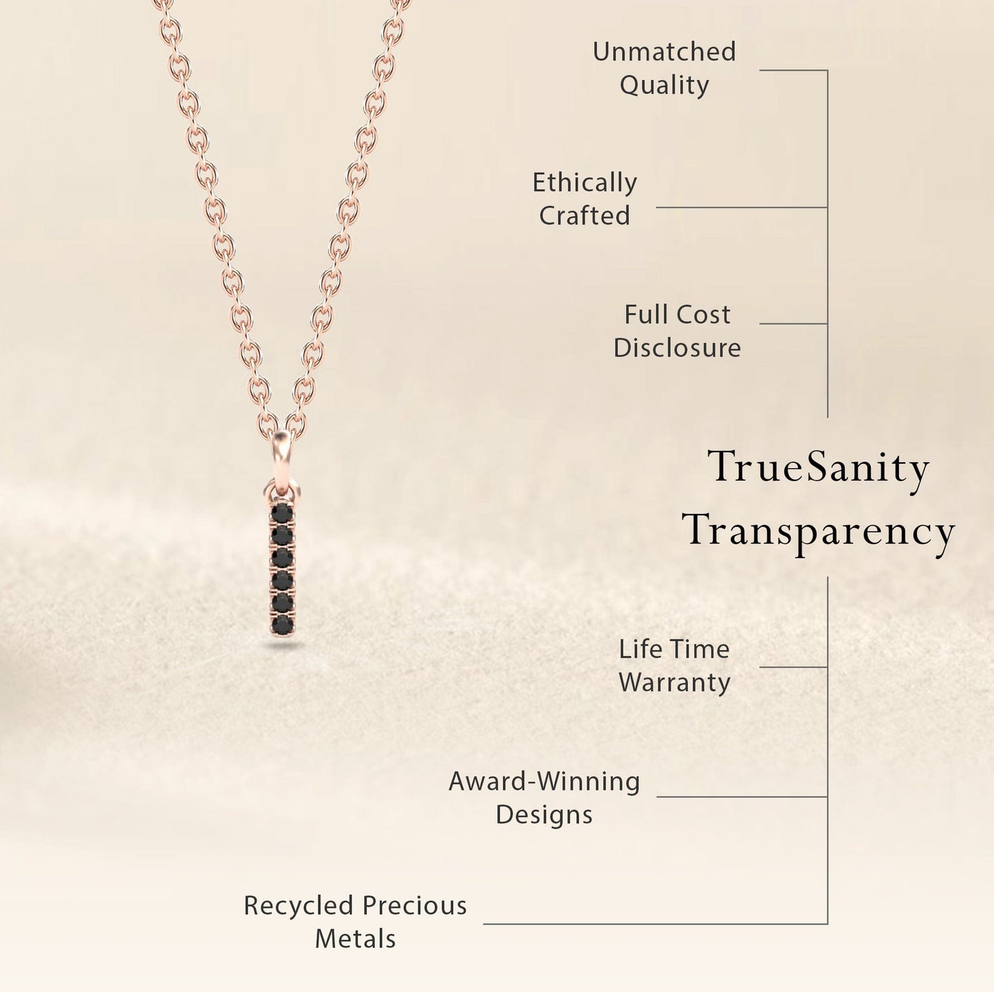 The Black Diamond Vertical Bar Necklace - Lalita features a delicate gold chain with a black diamond bar pendant. Enjoy unmatched quality, ethical crafting, cost transparency, warranty, award-winning design, and recycled precious metals.