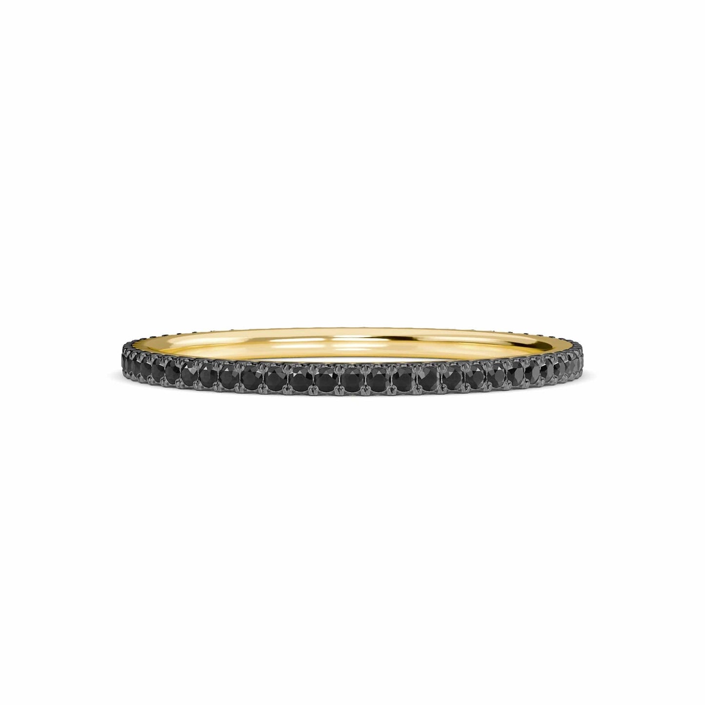The Black Diamond Ballad Eternity Ring - Colleen features a thin gold band adorned with small, round black diamonds set all around, displayed against a white background.