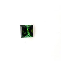 A 7.5mm Natural Green Tourmaline Square Princess gemstone with sharp facets is displayed on a plain white background.
