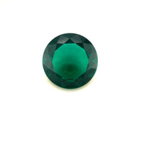A 13mm Exceptional Round Zambian Color Lab Created Emerald is centered on a plain white background.