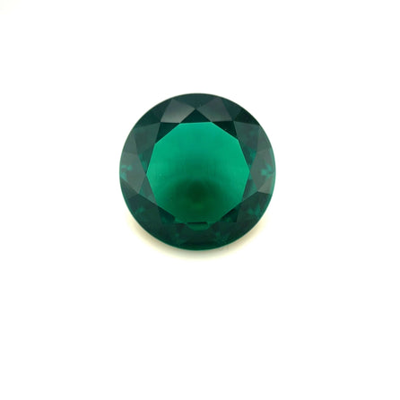 A 13mm Exceptional Round Zambian Color Lab Created Emerald is centered on a plain white background.