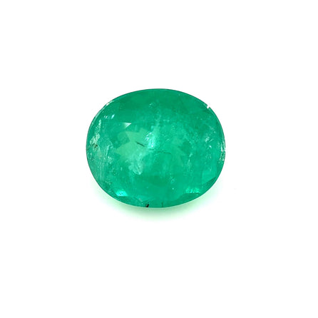 A 3.60Cts Better Oval Emerald gemstone is displayed on a plain white background.