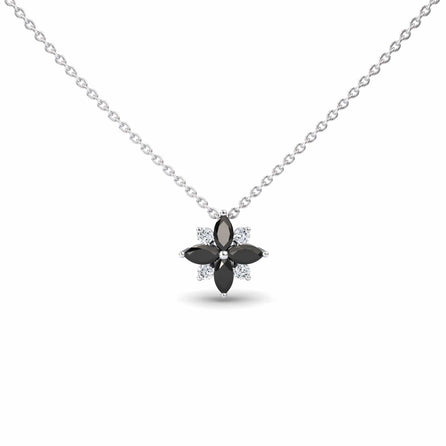 The Black & White Diamond Flower Necklace - Keira is a silver chain necklace with a flower-shaped pendant featuring four black marquise stones as petals and small clear stones between them.