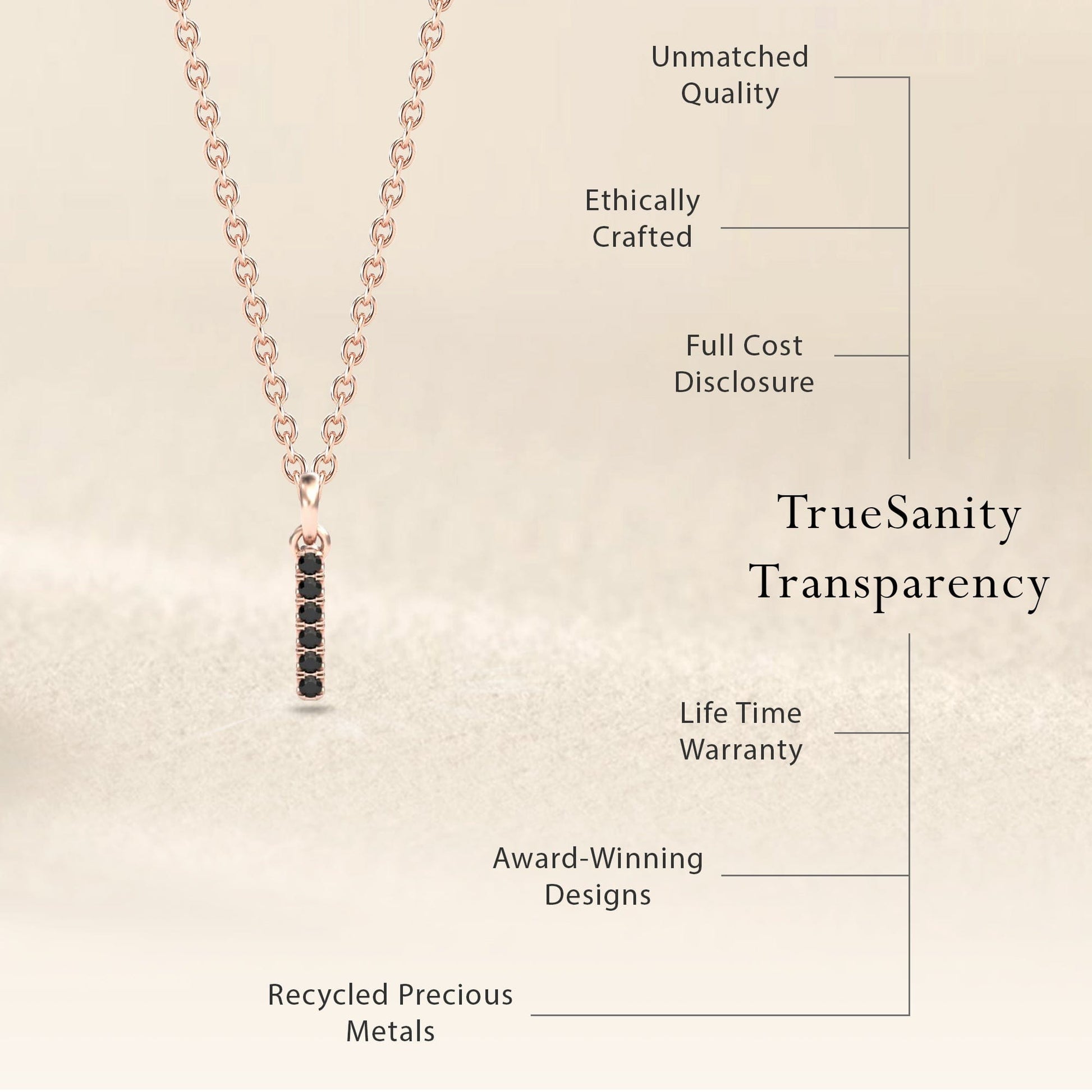 The Black Diamond Vertical Bar Necklace - Lalita features a delicate gold chain with a black diamond bar pendant. Enjoy unmatched quality, ethical crafting, cost transparency, warranty, award-winning design, and recycled precious metals.
