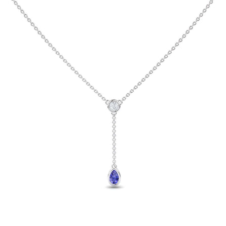 The Tanzanite & Diamond Elegant Drop Necklace - Daniela features a minimalist silver chain with a central round diamond and a short drop ending in a pear-shaped tanzanite gemstone pendant, offering an elegant and refined look.