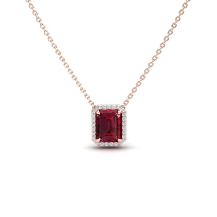 The Ruby & Diamond Halo Necklace - Hilary is a gold chain necklace with a rectangular red gemstone pendant encircled by small white diamonds, shown against a white background.