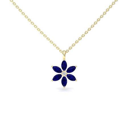 The Lab Grown Blue Sapphire & Diamond Floral Necklace - Erin features a gold chain with a flower-shaped pendant, six blue marquise lab-grown sapphires as petals, and a round lab-grown diamond at the center.