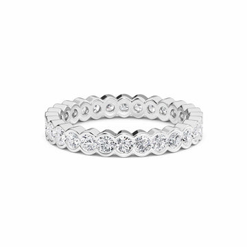 white gold ring with diamond accents on a white background