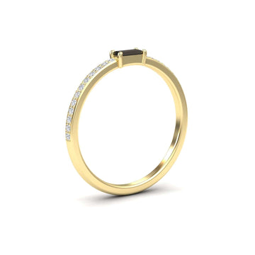 The Black & White Diamond Pave Ring - Dia is a slim gold band with small diamonds on the band and a rectangular black stone in a four-prong setting, shown on a white background.