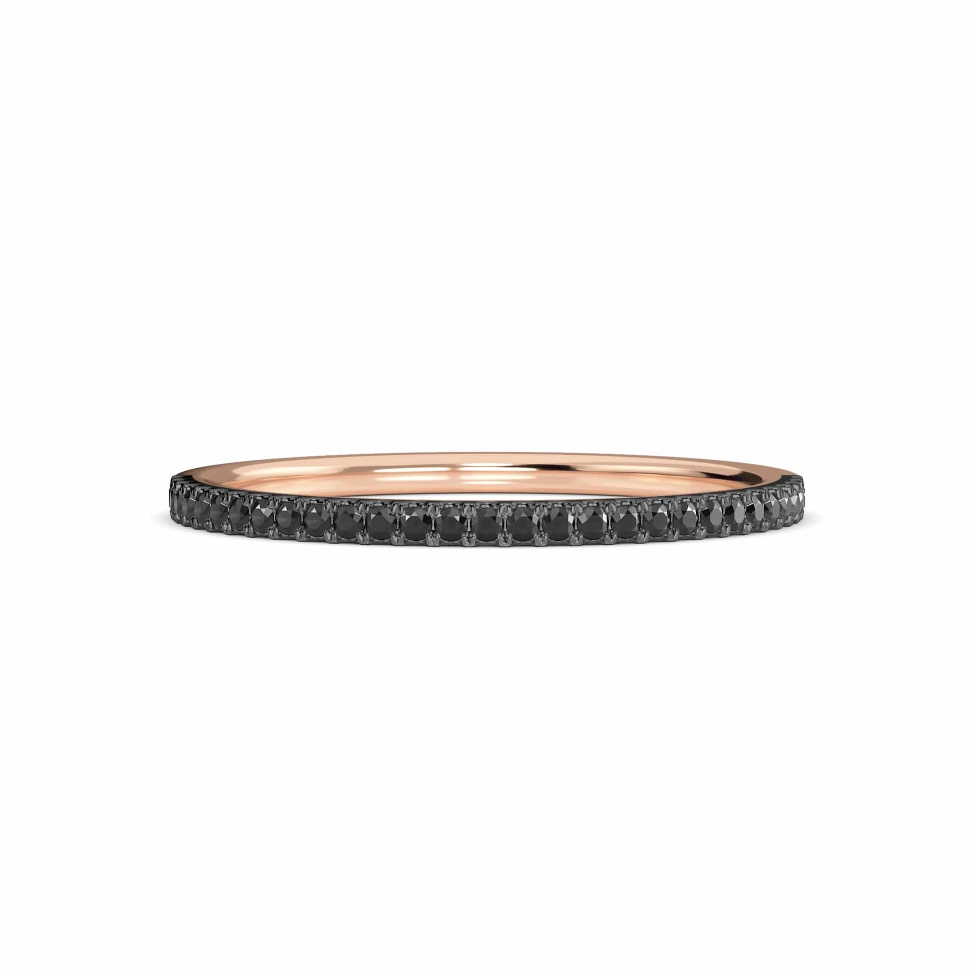 The Black Diamond Pave Half Eternity Band Ring - Stephanie is a thin rose gold band with a row of closely set black diamonds, shown from the side against a white background.