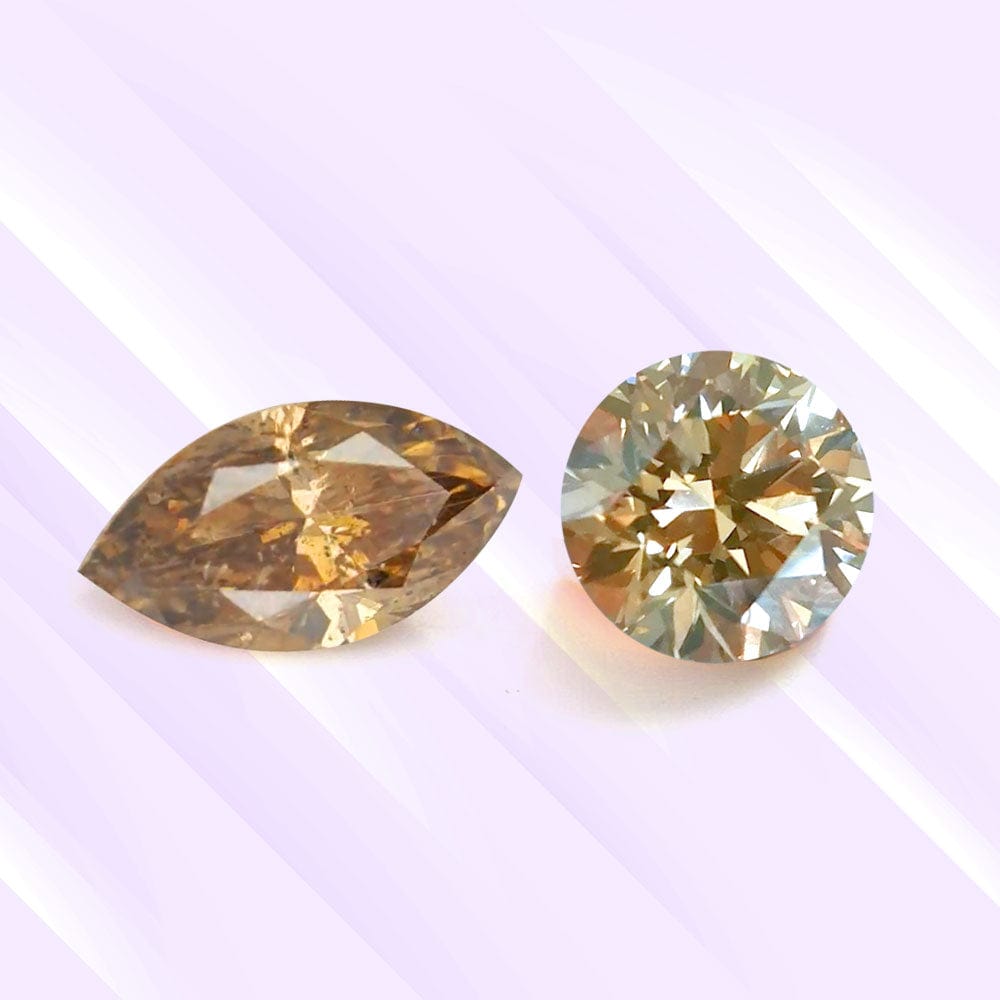 Two brown gemstones on a light purple background