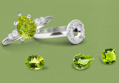 Silver rings with green gemstones on a green background