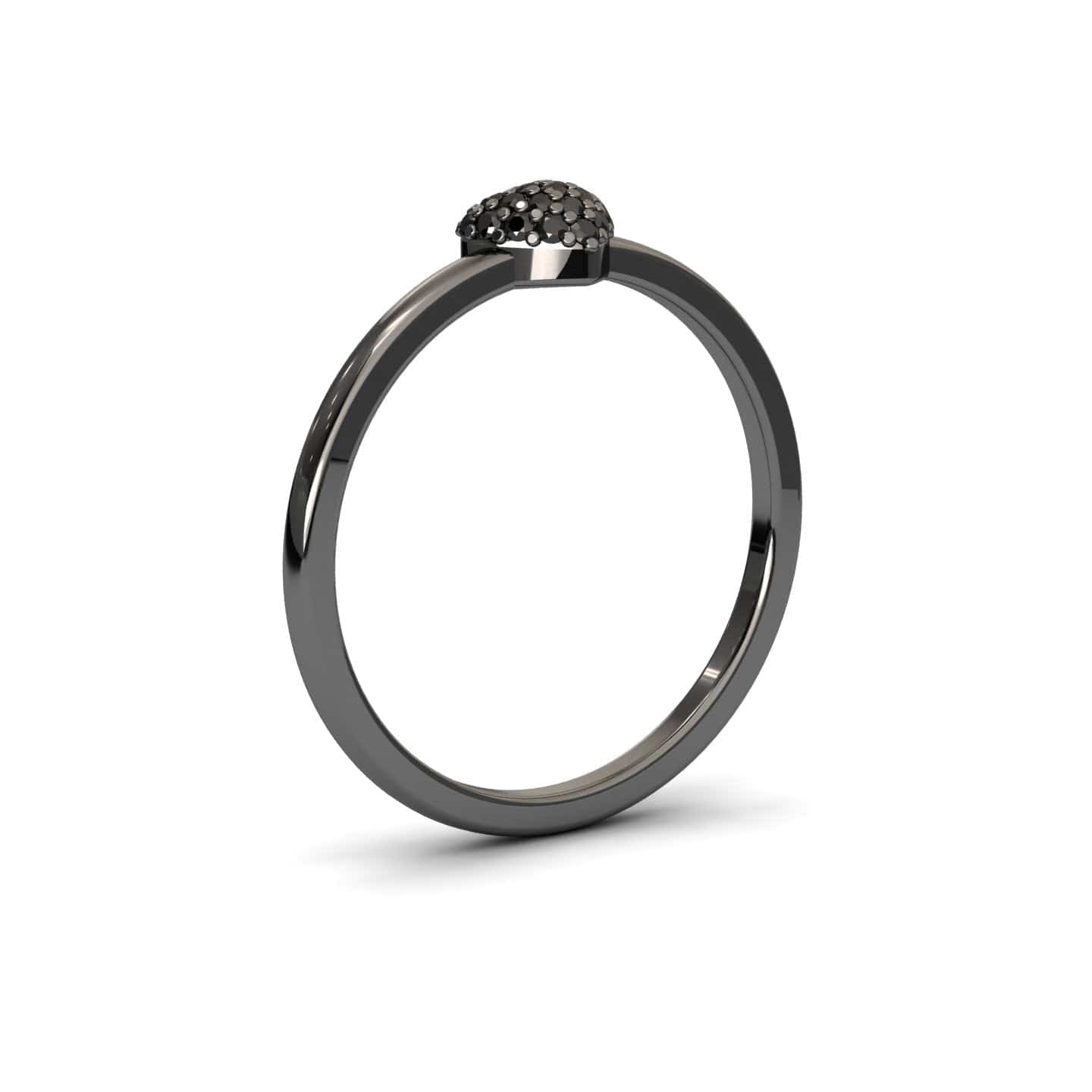 The Black Diamond Pave Heart Ring - Bonita is a sleek, minimalist black metal ring with a small curved dome paved with multiple tiny dark gemstones, shown on a white background.